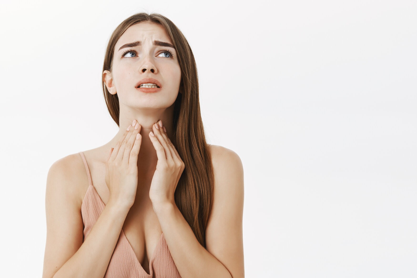 Lady with plaster on nose, doctor examining patients face after plastic surgery rsz woman getting ill before important meeting feeling discomfort and suffering from pain in throat touching neck frowning an clenching teeth from terrible feeling posing